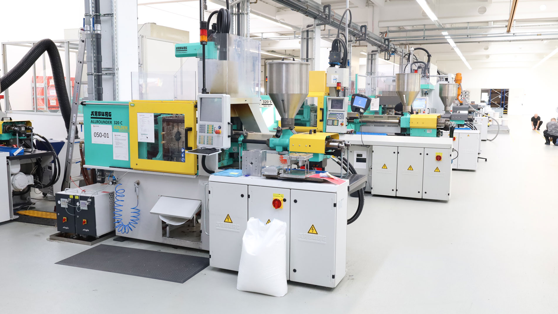 The core of Priomold's business: an array of injection molding machines producing prototypes and small series