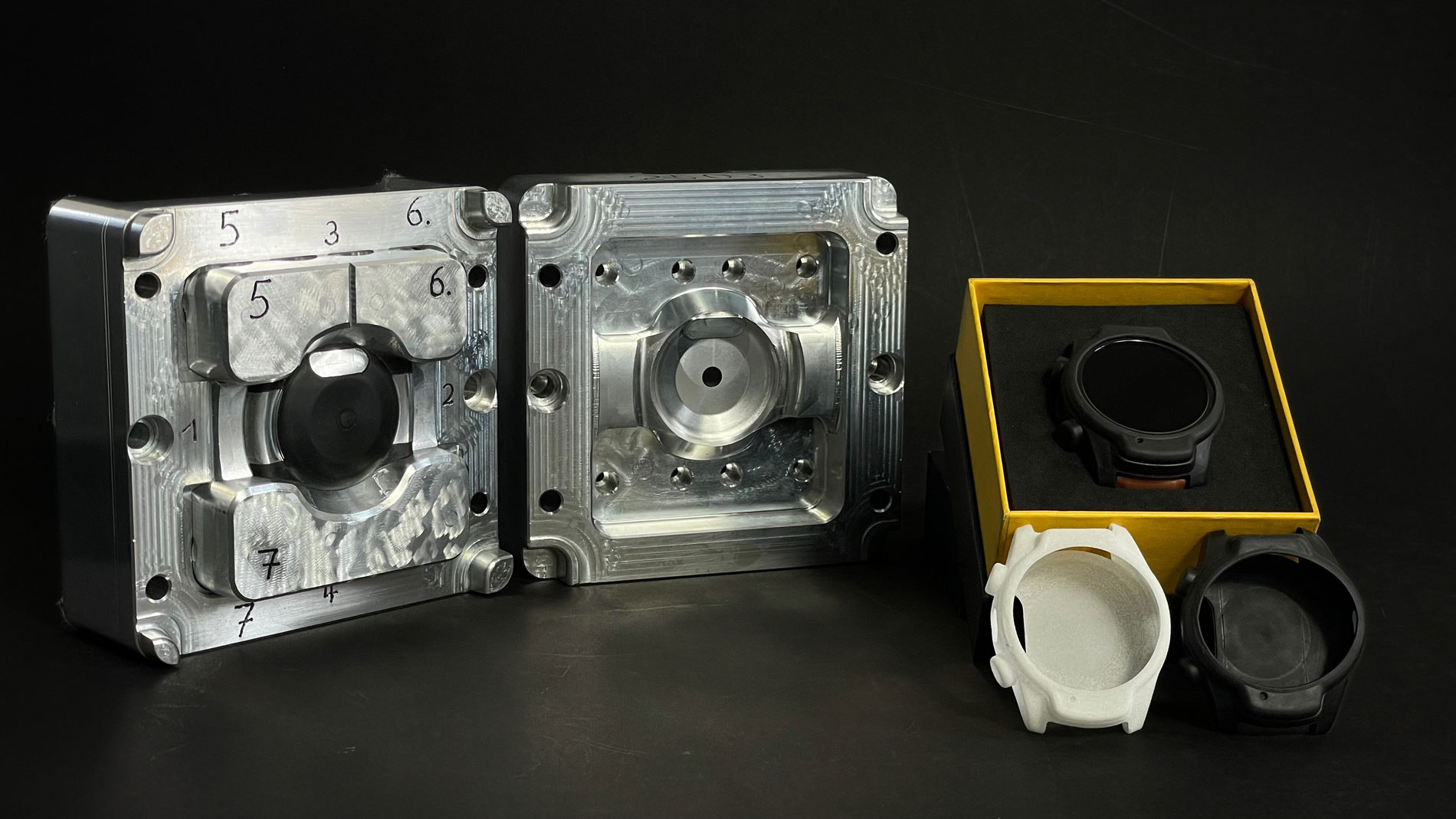 Small-series aluminum tool with laser-sintered prototype and injection-molded industrial smartwatch protective cover (end product). Image: cirp